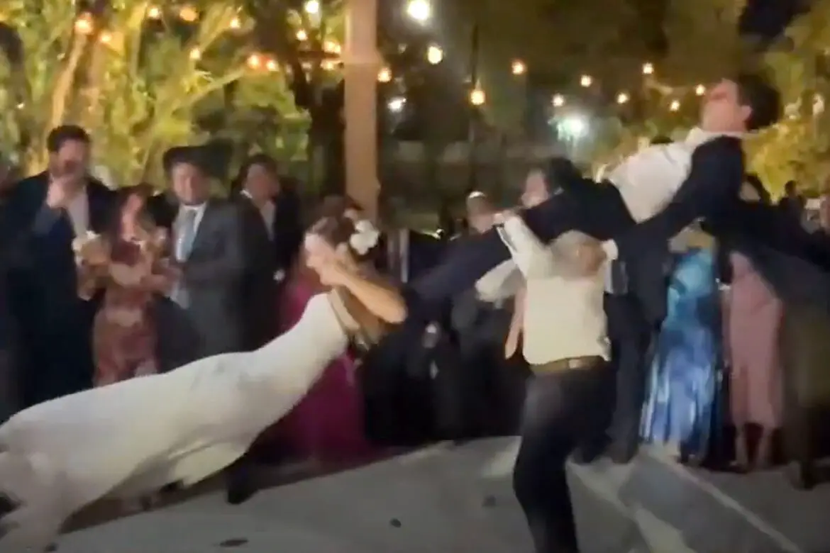 Bride, Groom and Guest’s Helicopter Dance Move at Wedding Ends in Disaster ArticlePure